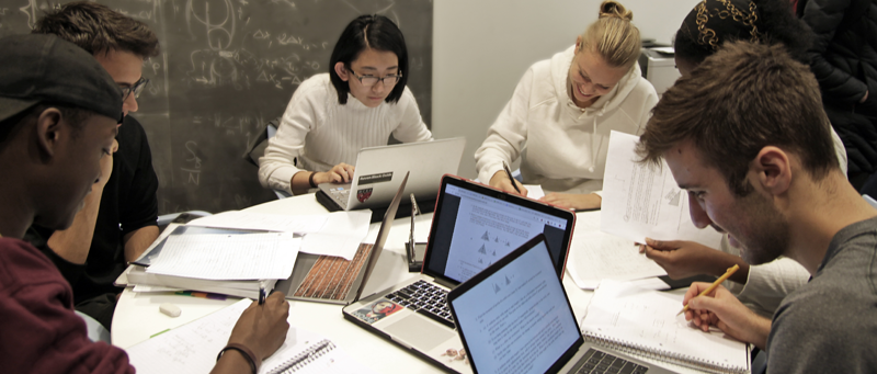 several undergrads studying